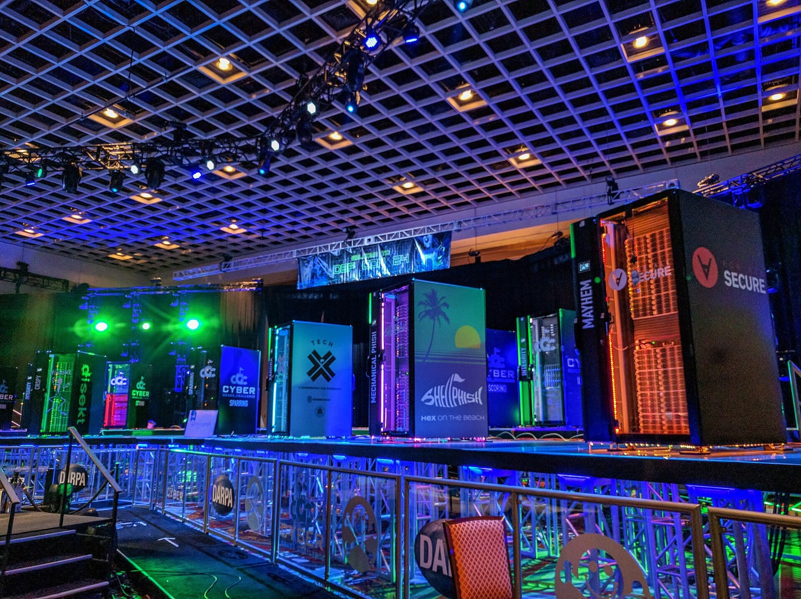 Computer racks of autonomous hacking systems on stage at the DARPA Cyber Grand Challenge at DEF CON 24