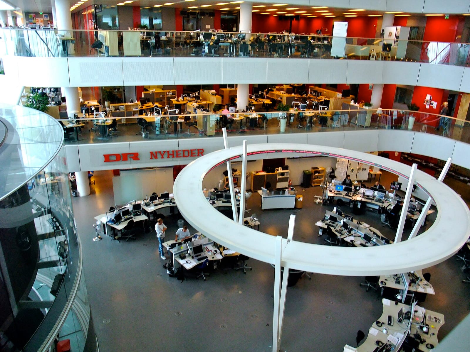 The multi-level newsroom of Danish broadcaster DR, with journalists at their desks