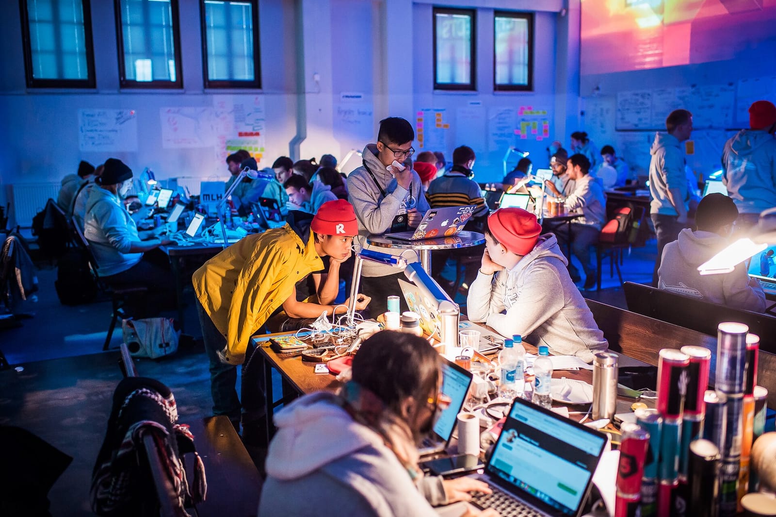 Participants working on laptops through the night at the Junction 2015 hackathon