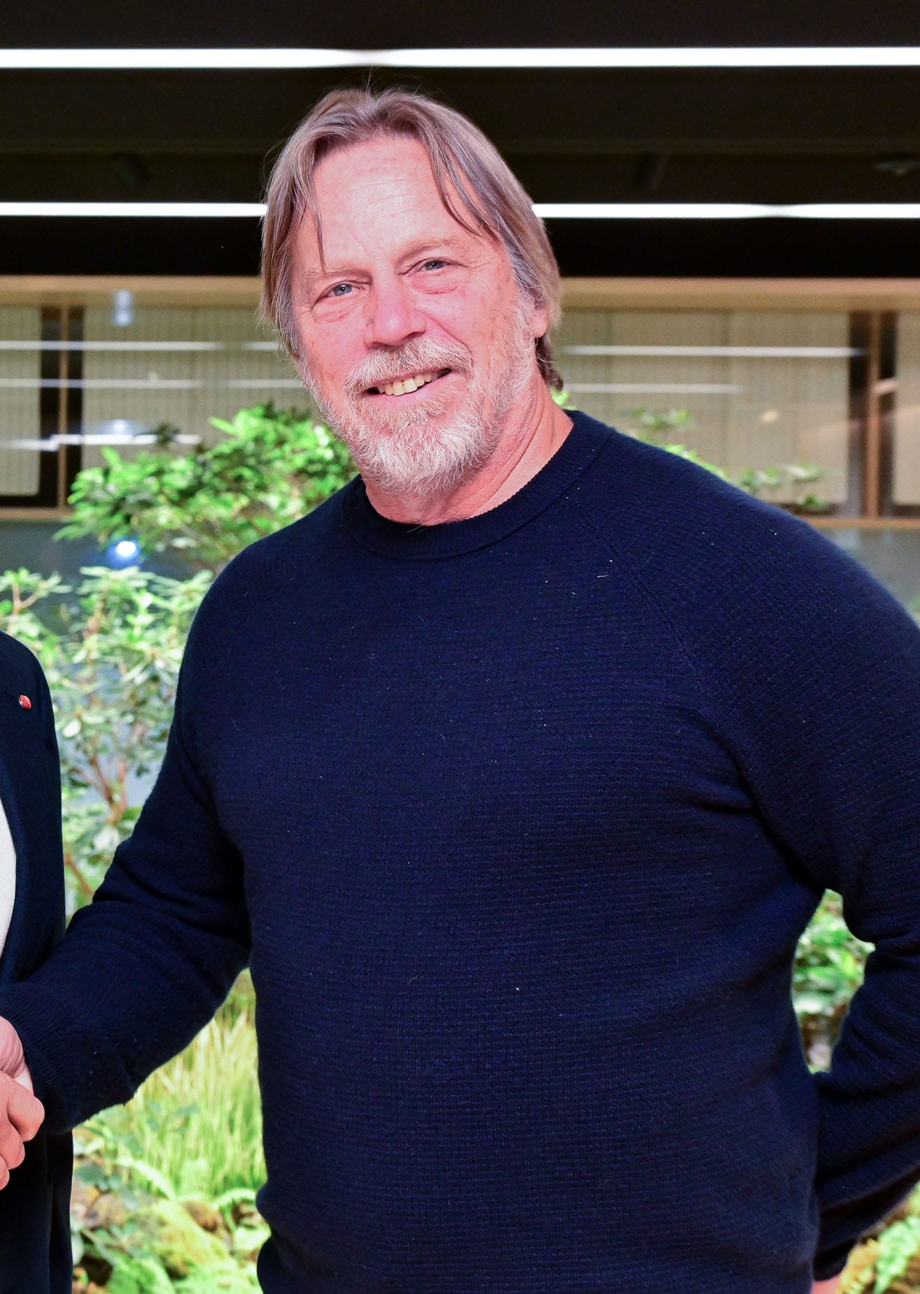 Jim Keller, chief executive of Tenstorrent, smiling in a navy sweater