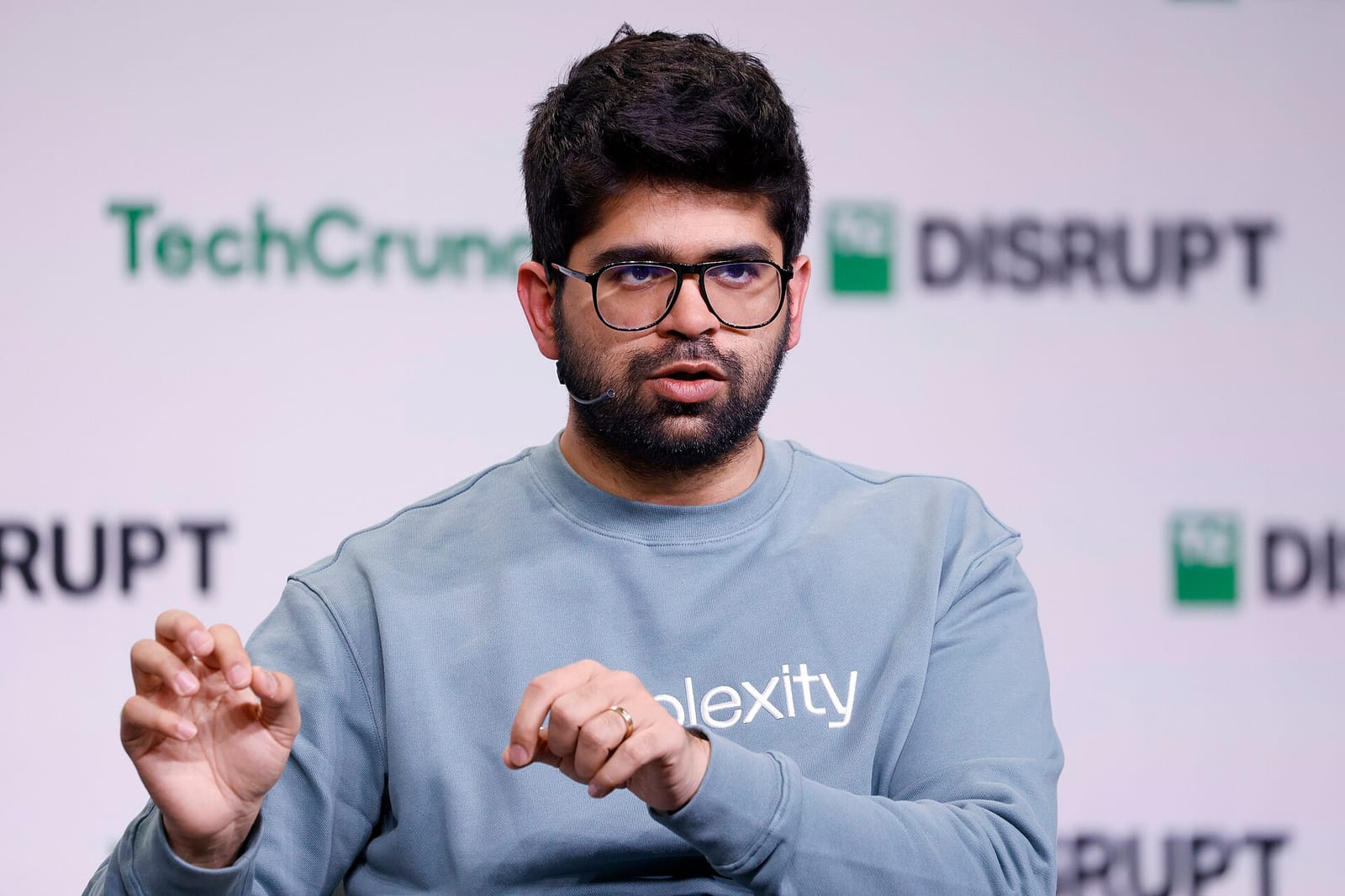 Perplexity CEO Aravind Srinivas speaking at TechCrunch Disrupt