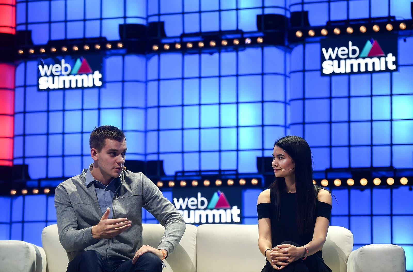 Canva co-founder and CEO Melanie Perkins, right, with Bolt CEO Markus Villig on stage at Web Summit 2019 in Lisbon